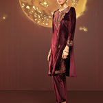 Woman wearing Mayal Maroon Embroidered Velvet Kurta Set paired with zardosi shoes