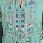 Close-up of the neckline and intricate work of Fariha Carnation Green Embroidered Raschel Net Dress