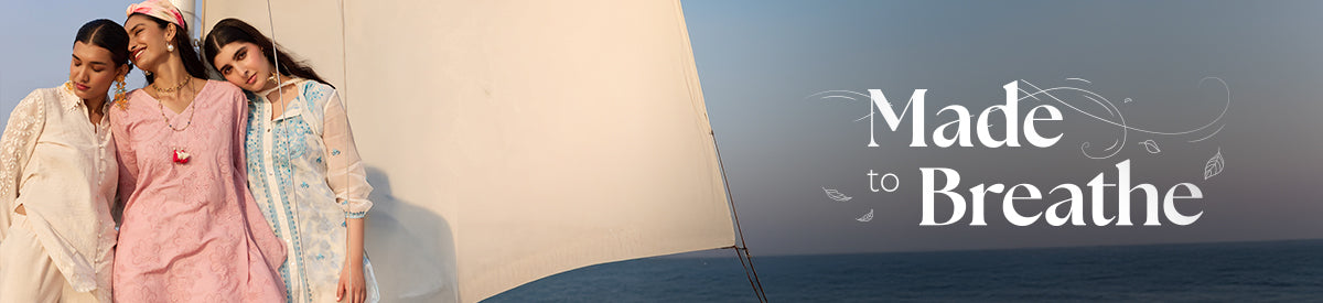 The model with Lavender Schiffli Embroidered Straight Kurta Set with Tassels showcases Lakshita’s Cotton Kurta Sets