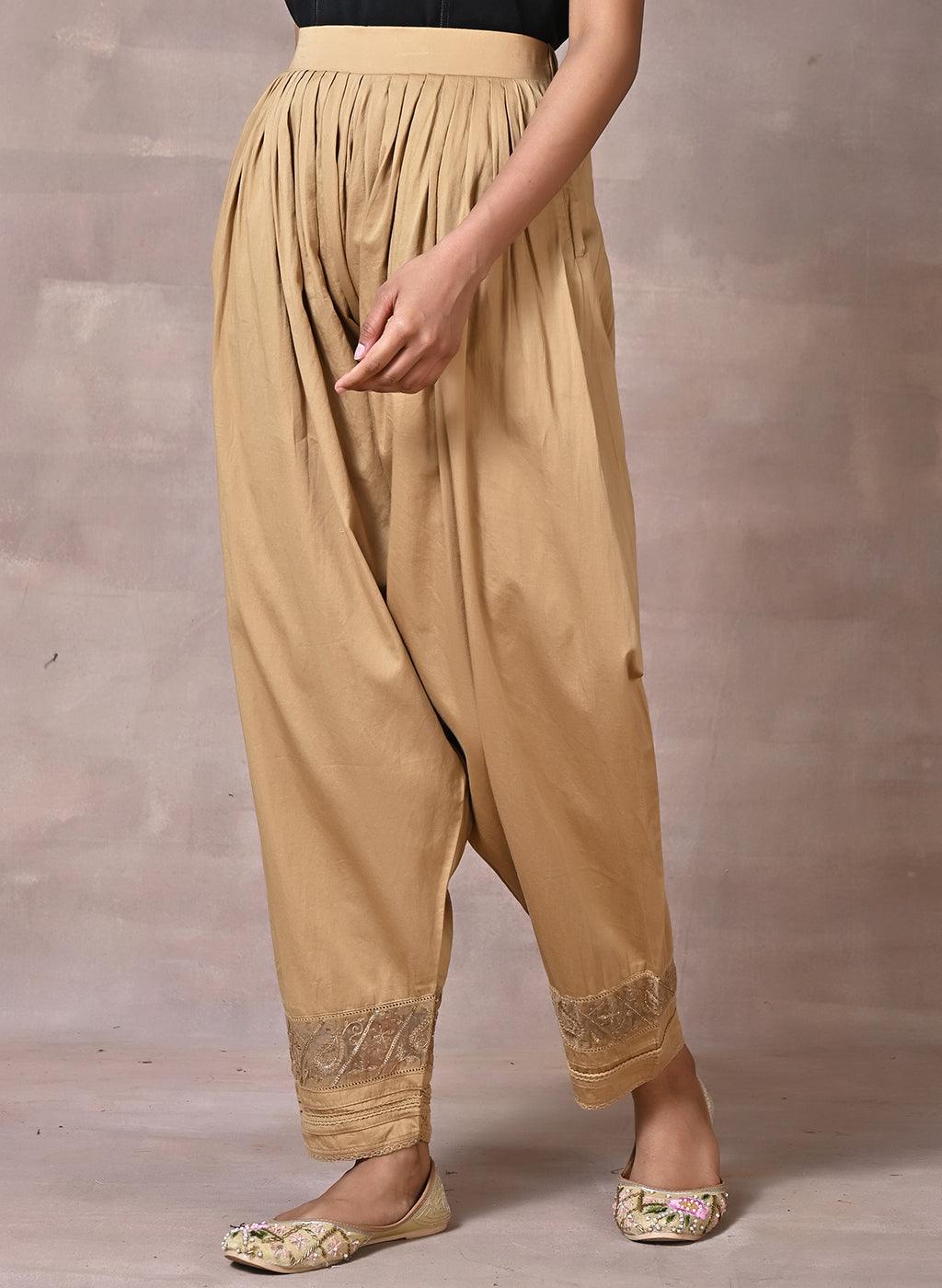 Gold Pleated Salwar with Lace Detailing and Mesh Hem - Lakshita