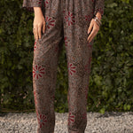 Straight-leg pants from Liah Black Rayon Kurta Set, showcasing intricate print and full-length fit