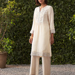 Front view of ivory embroidered cotton gauze kurta with delicate detailing
