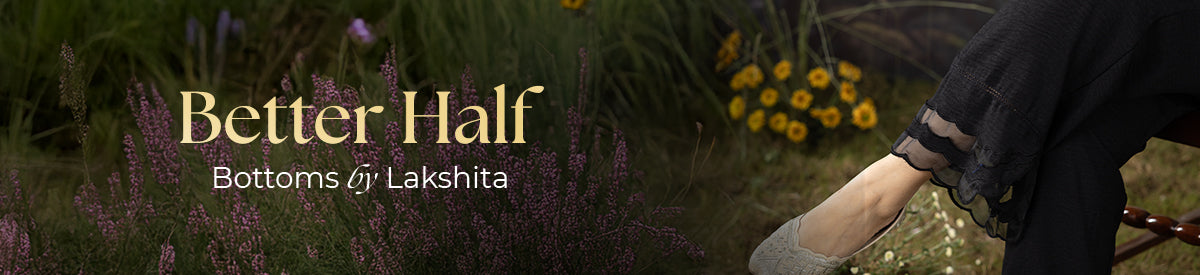 Three women lounging in stylish ethnic bottoms on a vintage cream couch showcasing the Lakshita Bottoms Collection