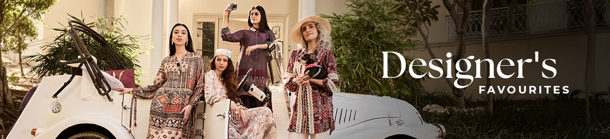 Chic and confident women in earthy-toned prints styled around a vintage convertible — Designer’s Favourites edit