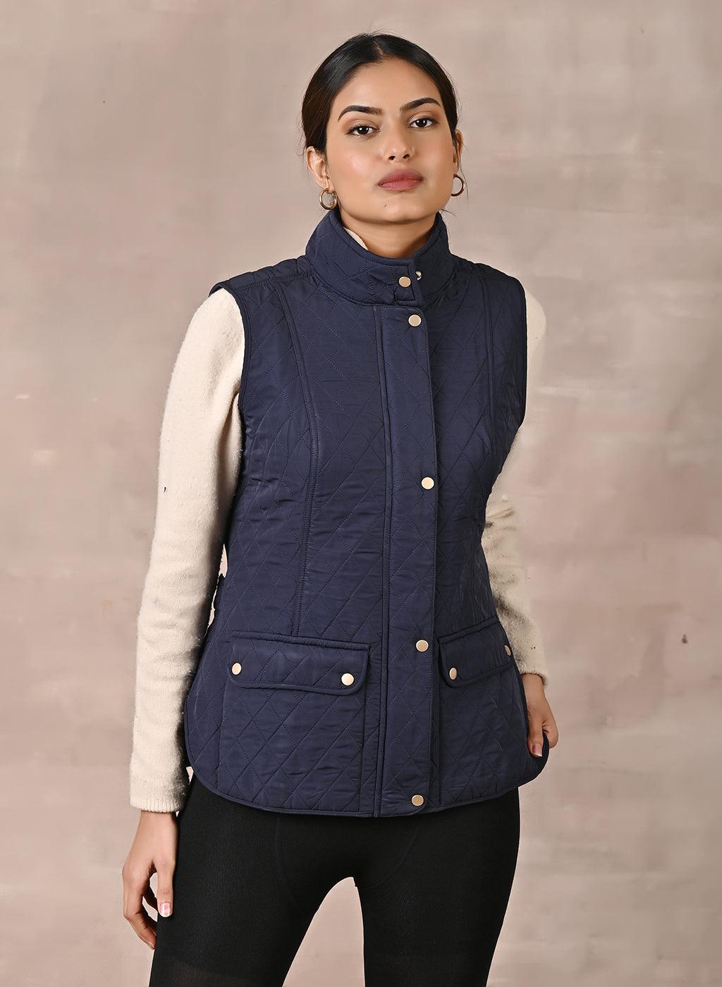 Navy Blue Solid Sleeveless Quilted Jacket With Rivets Detail &amp; Curved Hem - Lakshita