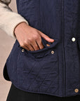 Navy Blue Solid Sleeveless Quilted Jacket With Rivets Detail & Curved Hem - Lakshita