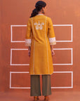 Yellow Embroidered Kurta with Asymmetric Hem and Schiffili Detailing on the Sleeves - Lakshita