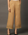 Beige Palazzos With Shimmery Details At The Hems - Lakshita